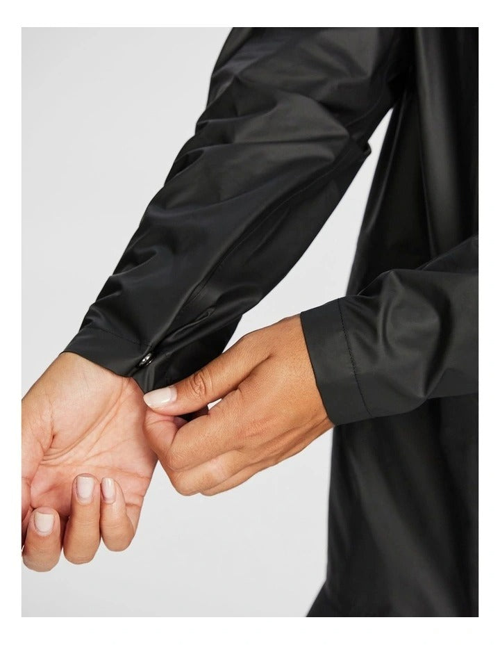 Rockwear Rain Jacket in Black, featuring a hood, Aquaguard zip, and snap close sleeve cuffs for weather protection.