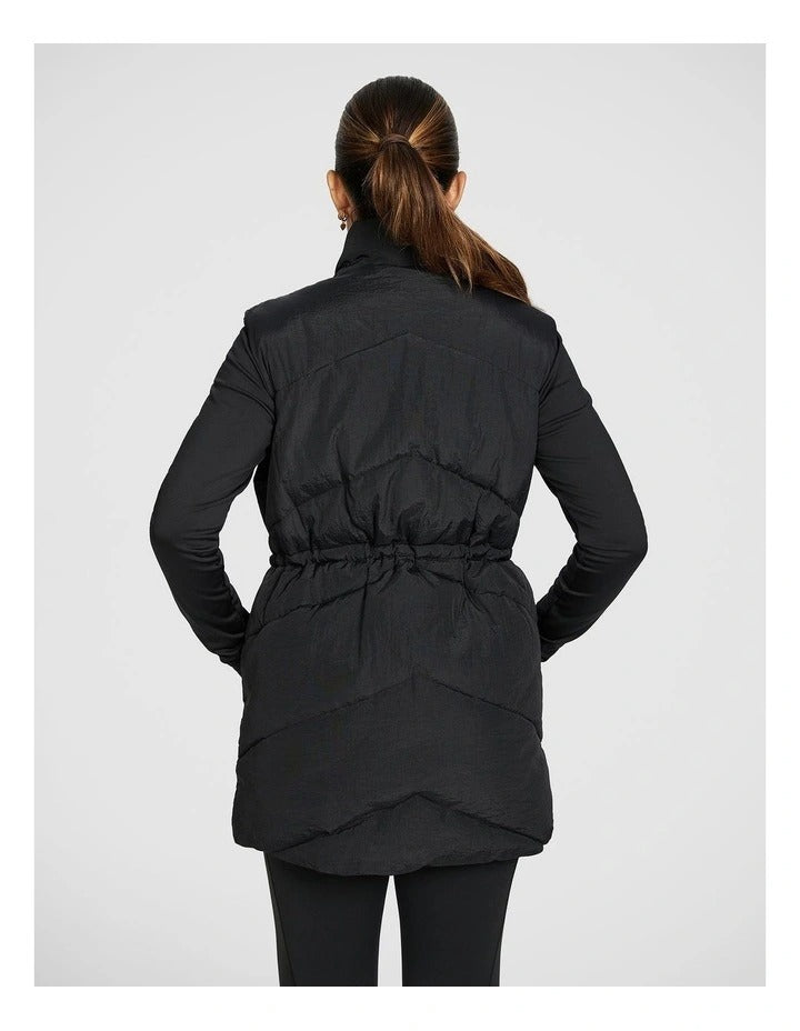 Black Longline Puffer Vest for Women by Rockwear – Adjustable Waist, Stand Collar, Full Zip, Side Phone Pockets
