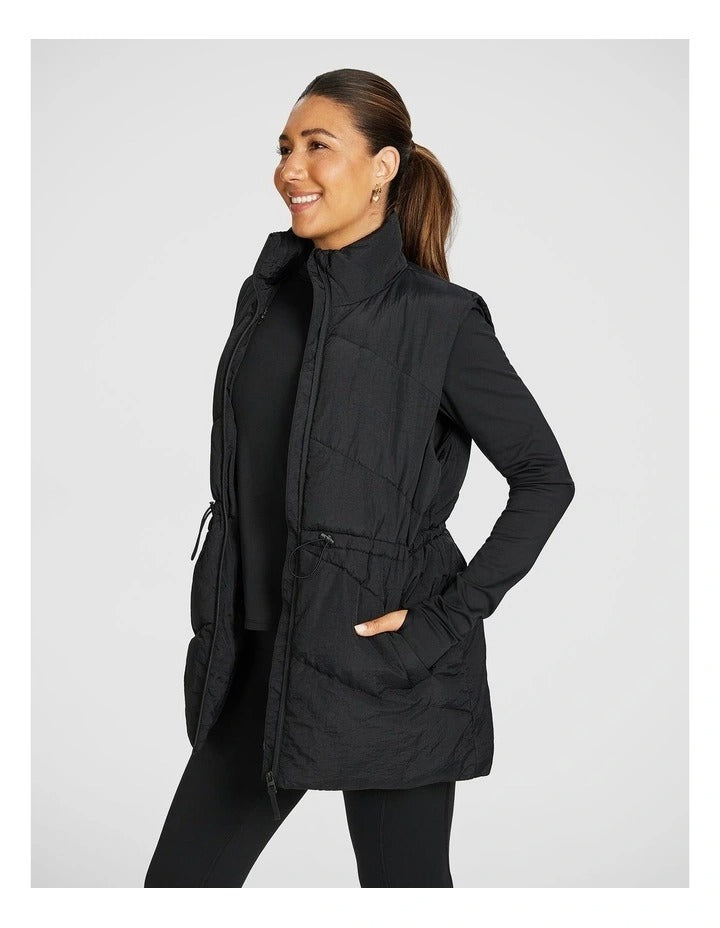 Black Longline Puffer Vest for Women by Rockwear – Adjustable Waist, Stand Collar, Full Zip, Side Phone Pockets