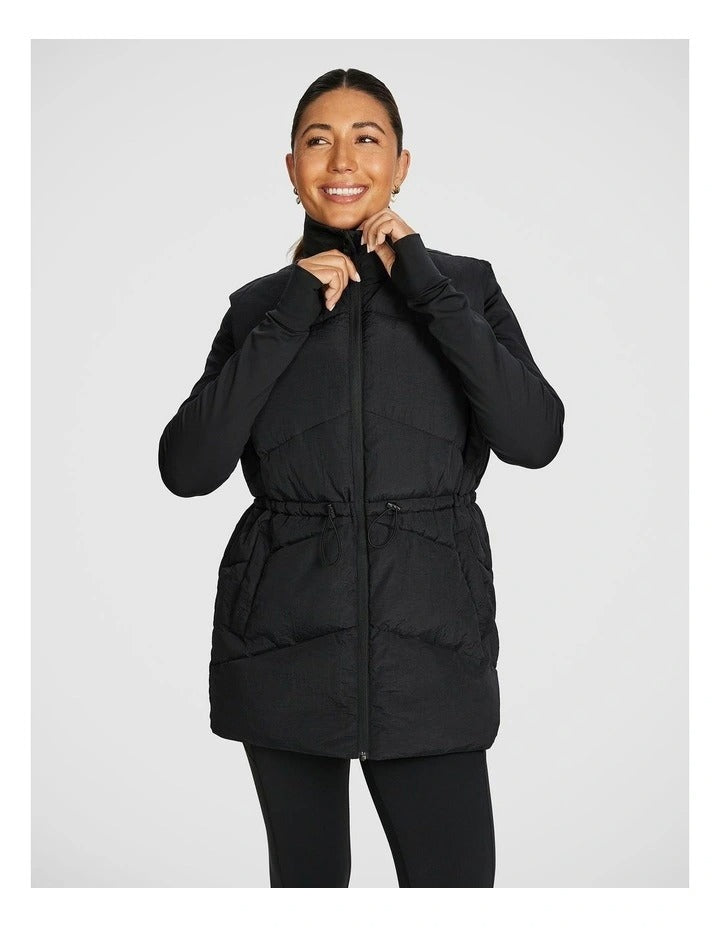 Black Longline Puffer Vest for Women by Rockwear – Adjustable Waist, Stand Collar, Full Zip, Side Phone Pockets