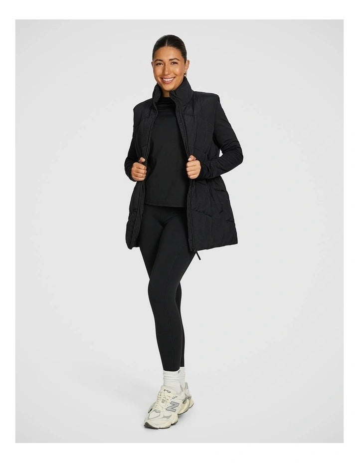 Black Longline Puffer Vest for Women by Rockwear – Adjustable Waist, Stand Collar, Full Zip, Side Phone Pockets