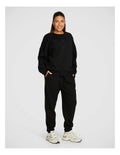 Rockwear Cosy Fleece Longline Crew Sweatshirt in Black offering full coverage and comfort.