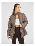 Rockwear Longline Puffer Jacket in Brown, women's full-length puffer jacket with side pockets, padded insulation, and elastic toggle waist for a flattering fit.