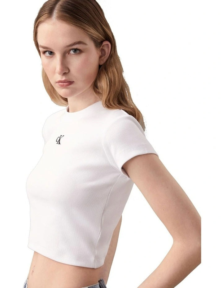 Calvin Klein Jeans white ribbed baby tee with short sleeves, crew neck, cropped fit, and Calvin Klein logo graphic on chest