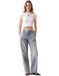 Calvin Klein Jeans white ribbed baby tee with short sleeves, crew neck, cropped fit, and Calvin Klein logo graphic on chest