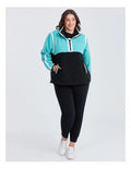 Taking Shape Active Polar Fleece Top Black and Aruba Blue – plus size women’s half zip fleece with high neckline, side pockets, and Heribong tape detail