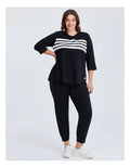 Taking Shape Active Cotton Stripe Top in Black with round hemline and 3/4 sleeves