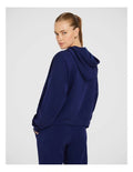 Rockwear Travel Zip Through Hoodie in Blue, featuring a relaxed fit, hip-length silhouette, and side pockets for a cozy, stylish look.