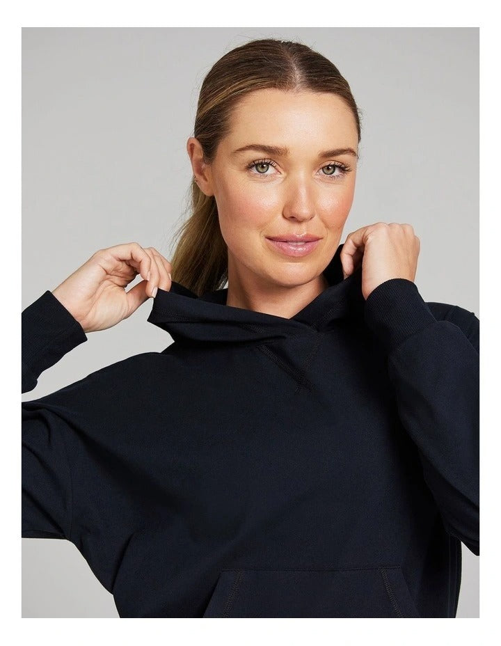 Rockwear Comfort Touch Long Sleeve Hoodie in Black, women's relaxed fit hoodie with soft interior, hip-length design, and hood for cozy athleisure style.