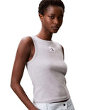 Calvin Klein Jeans grey ribbed cotton tank top with slim fit, scoop neckline, sleeveless design and woven monogram logo patch