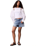 Calvin Klein Jeans white ribbed cotton tank top with slim fit, scoop neck, sleeveless design and woven monogram logo patch