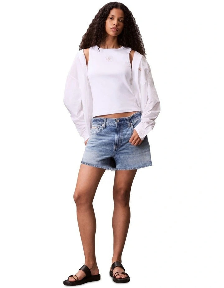 Calvin Klein Jeans white ribbed cotton tank top with slim fit, scoop neck, sleeveless design and woven monogram logo patch
