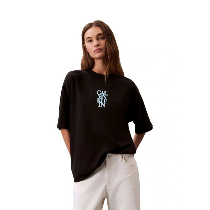 Calvin Klein Jeans oversized black t-shirt with bold logo graphic, boxy silhouette, crew neckline and short sleeves for women