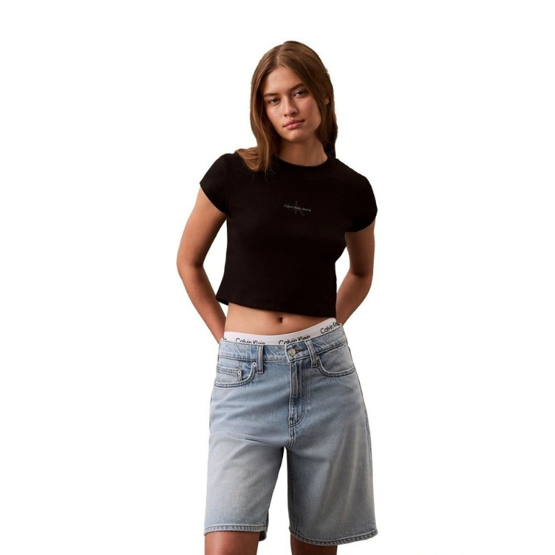 Calvin Klein Jeans black monogram baby tee with slim fit, cropped ribbed fabric, short sleeves, crew neckline and signature logo graphic