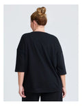Taking Shape Patch Pocket Sweat in Black – plus size cotton-blend top with oversized front patch pockets, round neckline, and relaxed fit