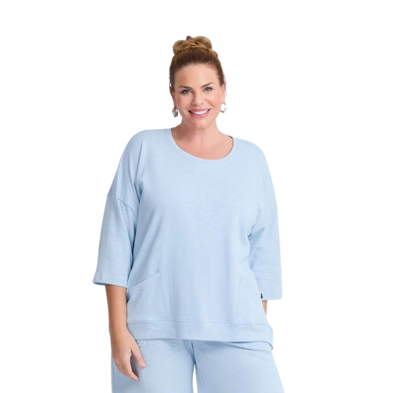 Taking Shape Patch Pocket Sweat in Ice Blue – plus size cotton-blend top with oversized front patch pockets, round neckline, and relaxed fit