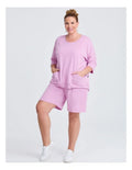 Taking Shape Patch Pocket Sweat in Lilac – plus size cotton-blend top with oversized patch pockets, round neckline, and relaxed fit