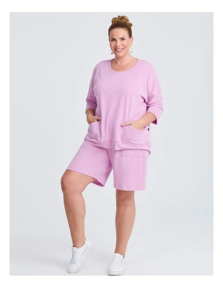 Taking Shape Patch Pocket Sweat in Lilac – plus size cotton-blend top with oversized patch pockets, round neckline, and relaxed fit