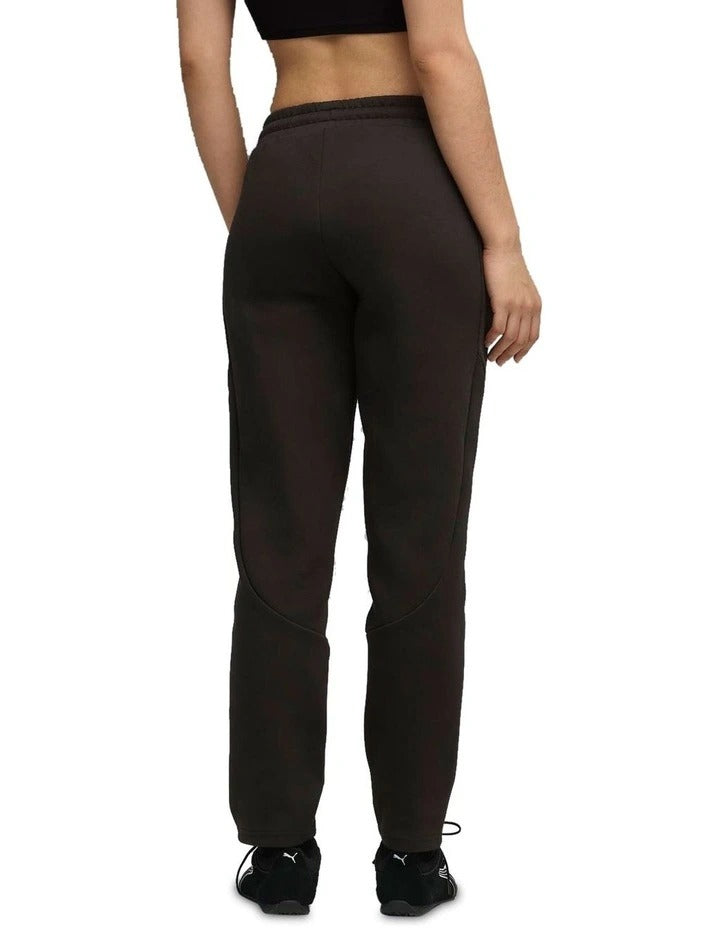 Person wearing black sweatpants on a white background