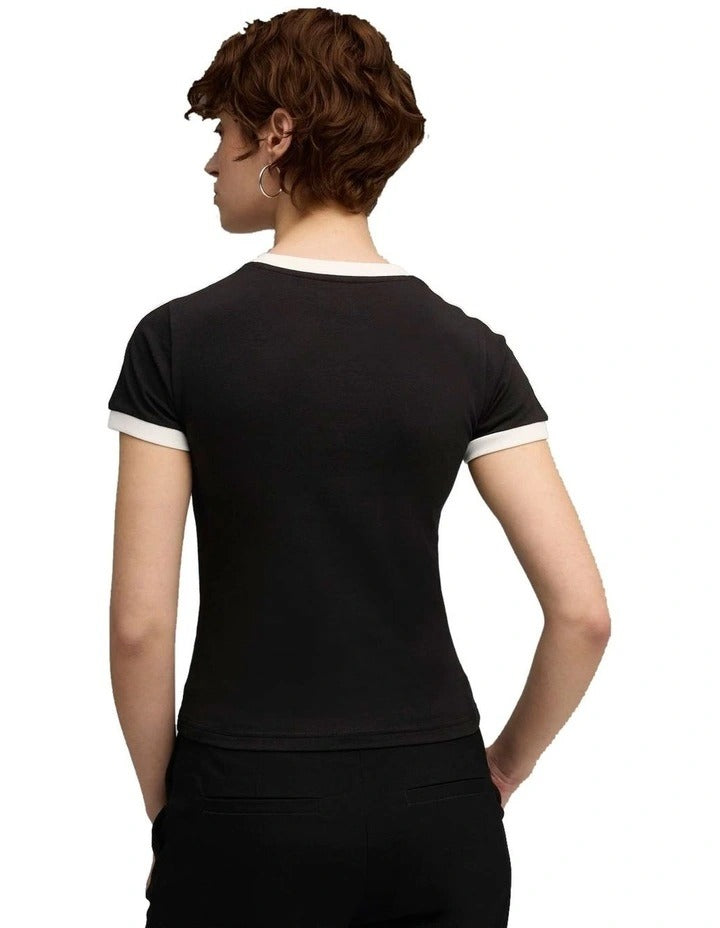 Puma T7 Slim Tee with T7 panel inserts, rib neckline, rib cuffs, and embroidered Cat Logo on chest – slim fit athletic t-shirt made with recycled polyester and elastane