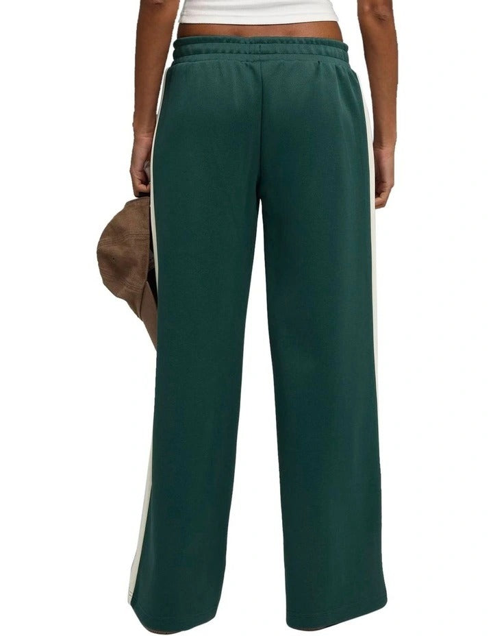 Green wide-leg pants with a white stripe on a white background