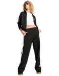 Puma T7 Always On Straight Pants with recycled polyester blend, side stripe panel inserts, zippered seam pockets, elastic waistband, and embroidered Cat Logo