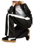 Puma T7 Always On Straight Pants with recycled polyester blend, side stripe panel inserts, zippered seam pockets, elastic waistband, and embroidered Cat Logo