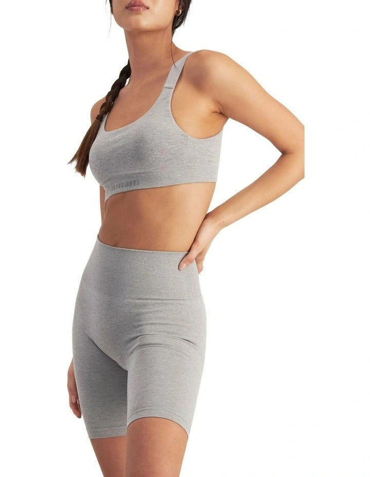 Move Seamless Bralette in light marle with adjustable straps, removable cups, and moisture-wicking fabric for smooth everyday comfort