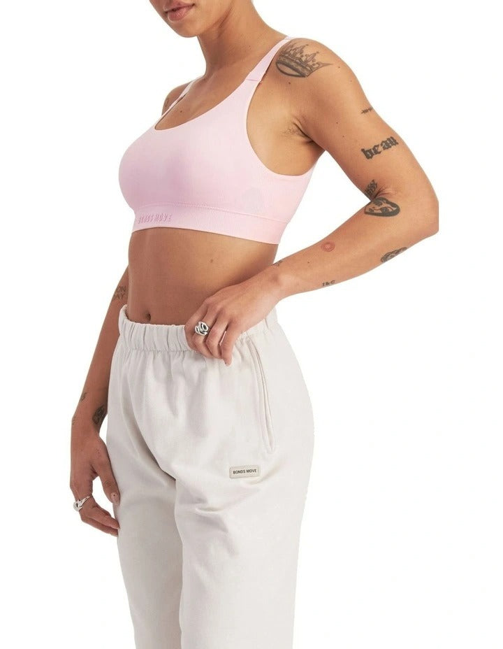Move Seamless Bralette with adjustable straps, removable cups, and moisture-wicking nylon fabric for medium support and comfort