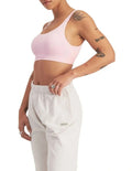 Move Seamless Bralette with adjustable straps, removable cups, and moisture-wicking nylon fabric for medium support and comfort