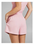 Rockwear women’s pink cosy fleece shorts with relaxed fit, side phone pockets, and regular rise, perfect for lounging or casual outings.