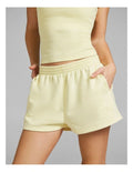 Rockwear women’s yellow cosy fleece shorts with relaxed fit, regular rise, and side phone pockets, perfect for lounging or casual wear.