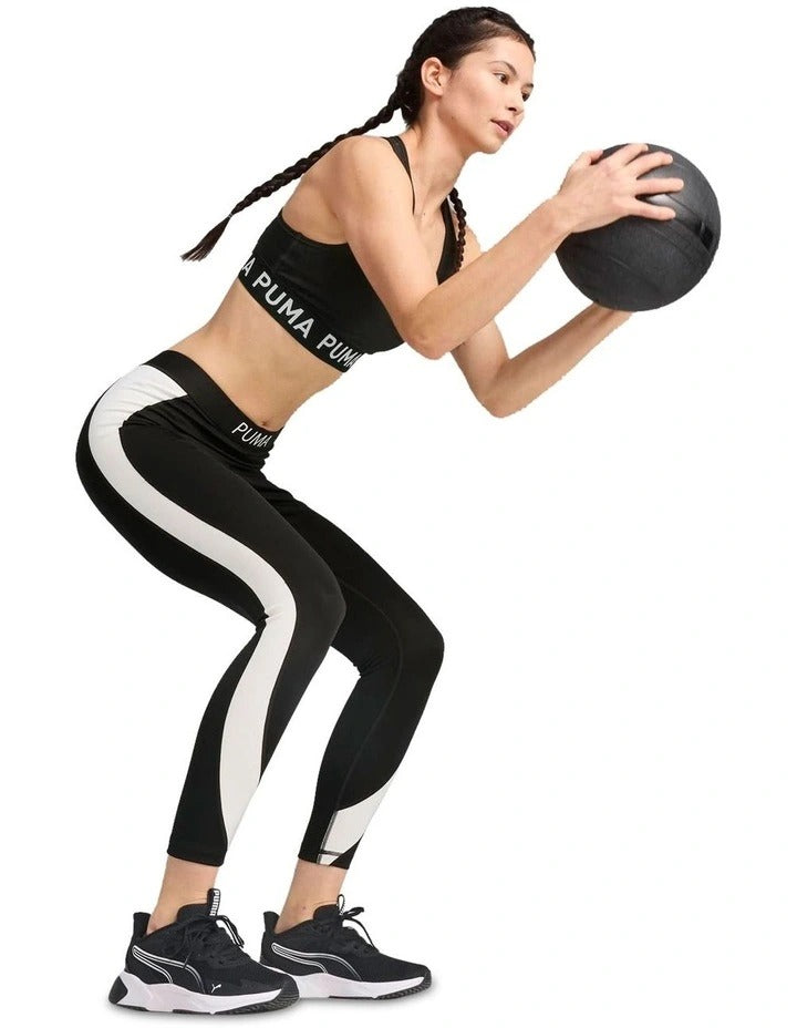 Puma 4Keeps Strong Bra for women with drycell technology, racerback straps, and branded elastic waistband