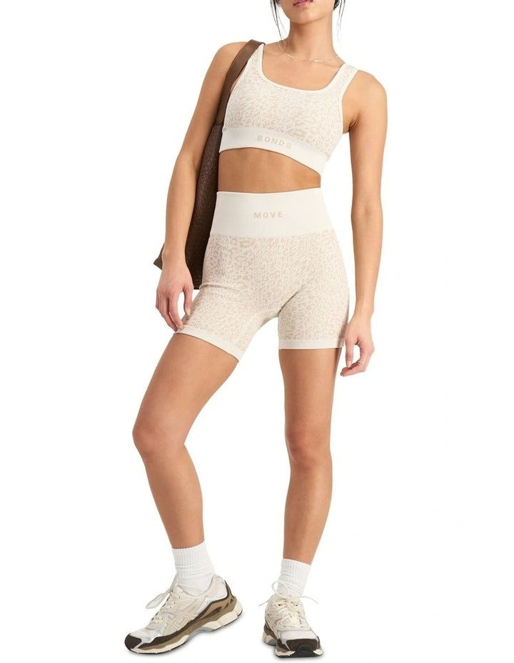 Move Rib Seamless Midi Short with jacquard knit design, wide waistband, stretchy ribbed fabric, and moisture-wicking finish for active comfort