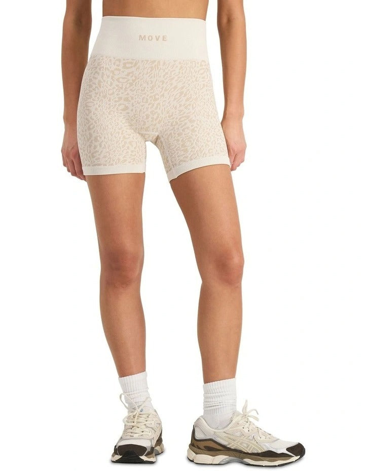 Move Rib Seamless Midi Short with jacquard knit design, wide waistband, stretchy ribbed fabric, and moisture-wicking finish for active comfort