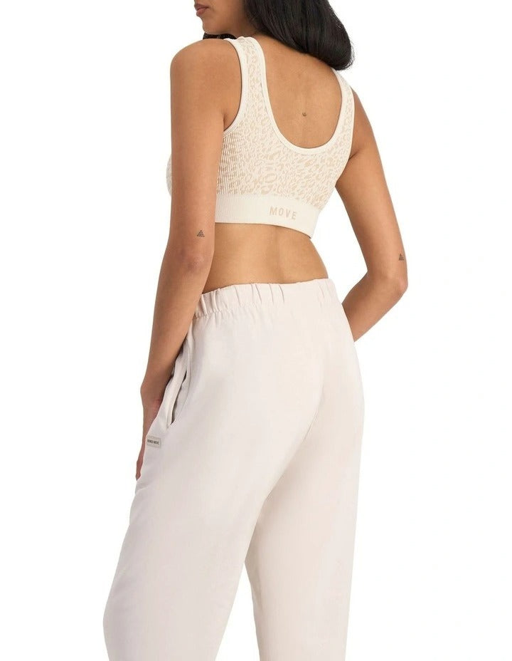 Move Rib Seamless Crop Bra with jacquard knit print, scoop neckline, removable cups and stretchy ribbed fabric for soft support