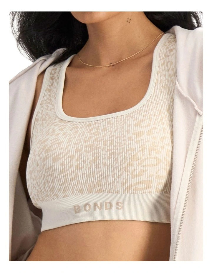 Move Rib Seamless Crop Bra with jacquard knit print, scoop neckline, removable cups and stretchy ribbed fabric for soft support