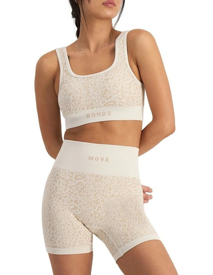 Move Rib Seamless Crop Bra with jacquard knit print, scoop neckline, removable cups and stretchy ribbed fabric for soft support