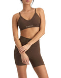 Move Rib Seamless Crop Bra in ribbed stretch fabric with removable cups, soft V-neckline, and supportive underbust elastic for low impact activities