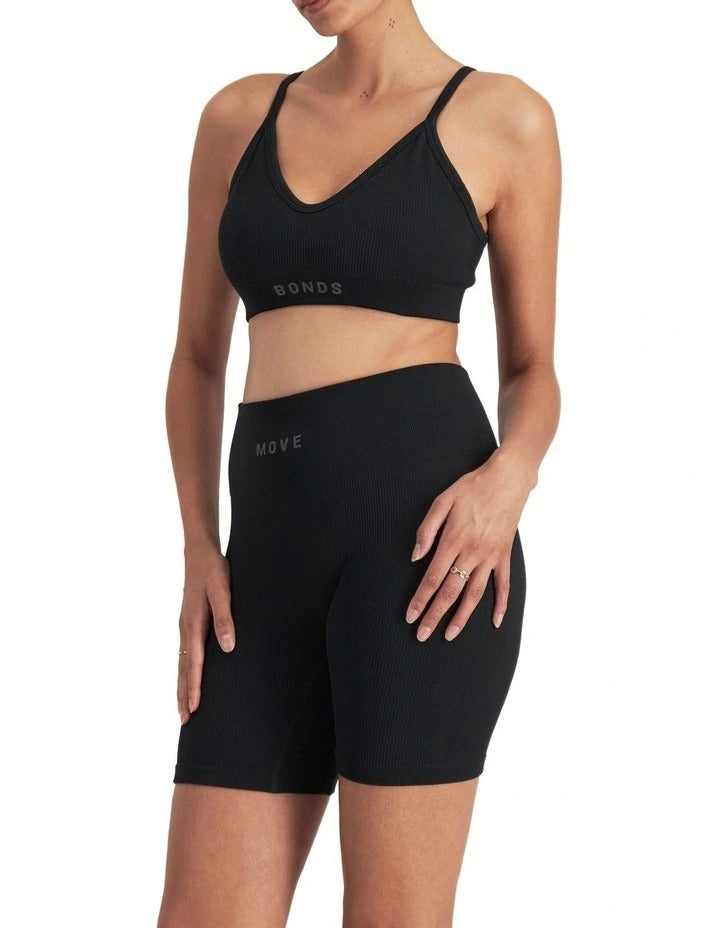 Move Rib Seamless Crop Bra with vee neckline, ribbed stretch fabric, removable cups, and underbust elastic for low impact support