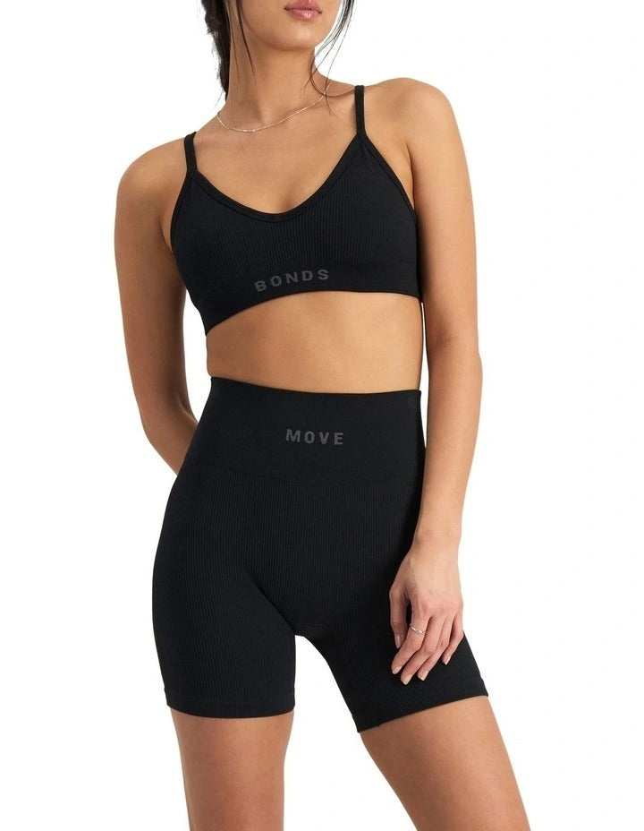 Move Rib Seamless Crop Bra with vee neckline, ribbed stretch fabric, removable cups, and underbust elastic for low impact support