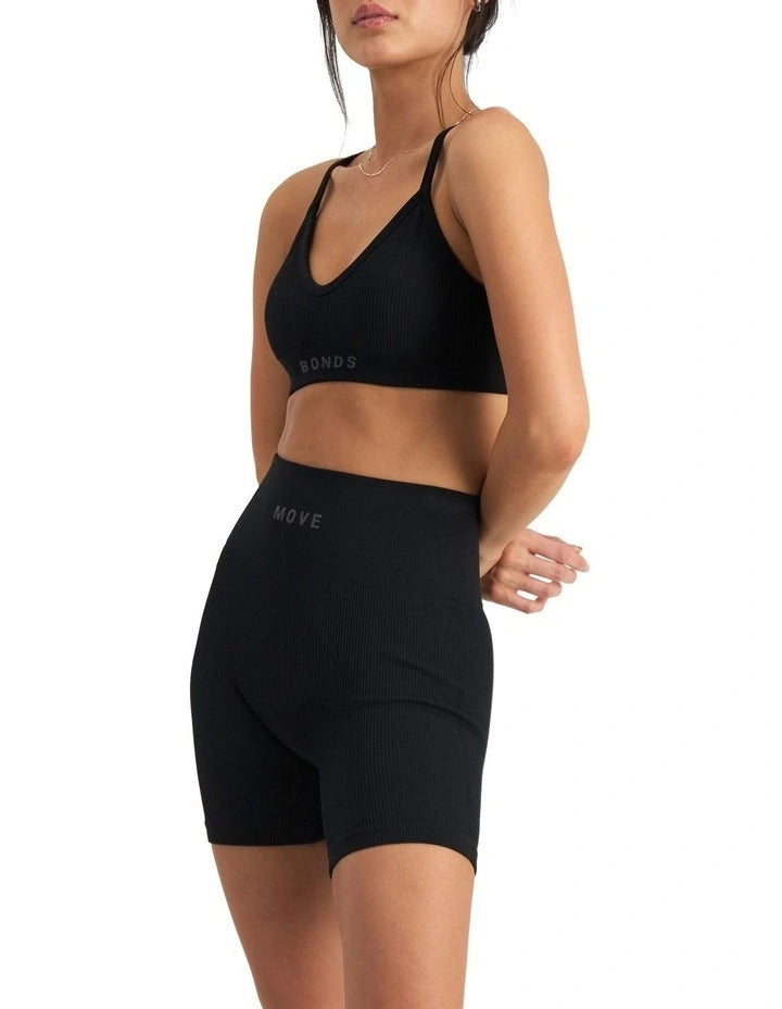 Move Rib Seamless Crop Bra with vee neckline, ribbed stretch fabric, removable cups, and underbust elastic for low impact support
