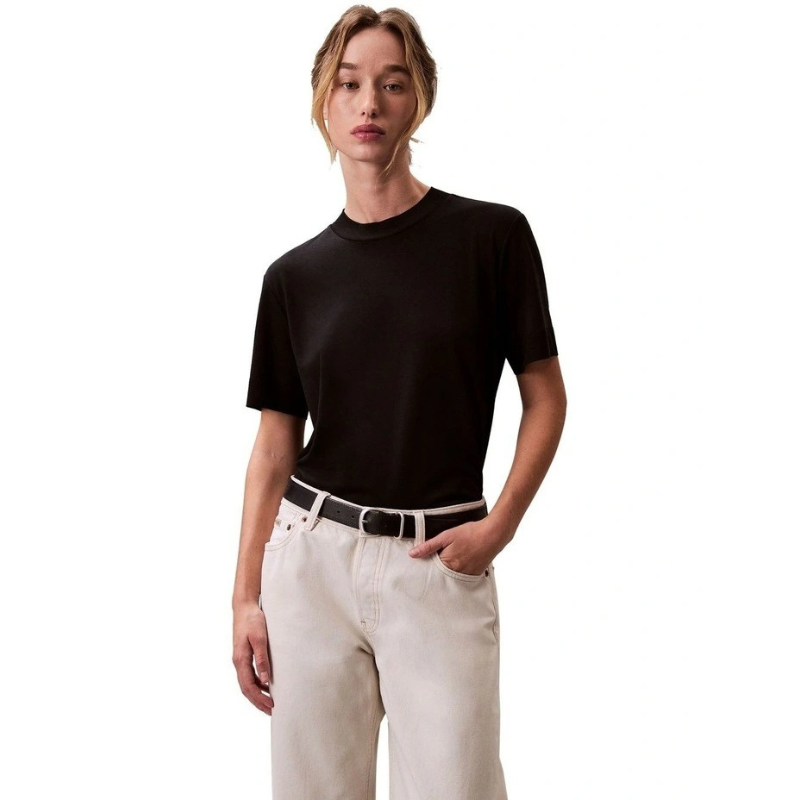 Calvin Klein women’s mock neck top in lyocell cotton blend with ribbed trims, classic fit, and signature logo.