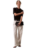Calvin Klein women’s mock neck top in lyocell cotton blend with ribbed trims, classic fit, and signature logo.