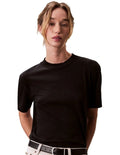 Calvin Klein women’s mock neck top in lyocell cotton blend with ribbed trims, classic fit, and signature logo.