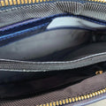 LeatherLuxe navy blue leather clutch bag and shoulder crossbody handbag for women – elegant, premium genuine leather design with adjustable strap and gold accents.