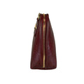 Elegant dark red genuine leather clutch bag with shoulder strap and crossbody design — LeatherLuxe premium women’s handbag