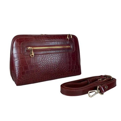 Elegant dark red genuine leather clutch bag with shoulder strap and crossbody design — LeatherLuxe premium women’s handbag