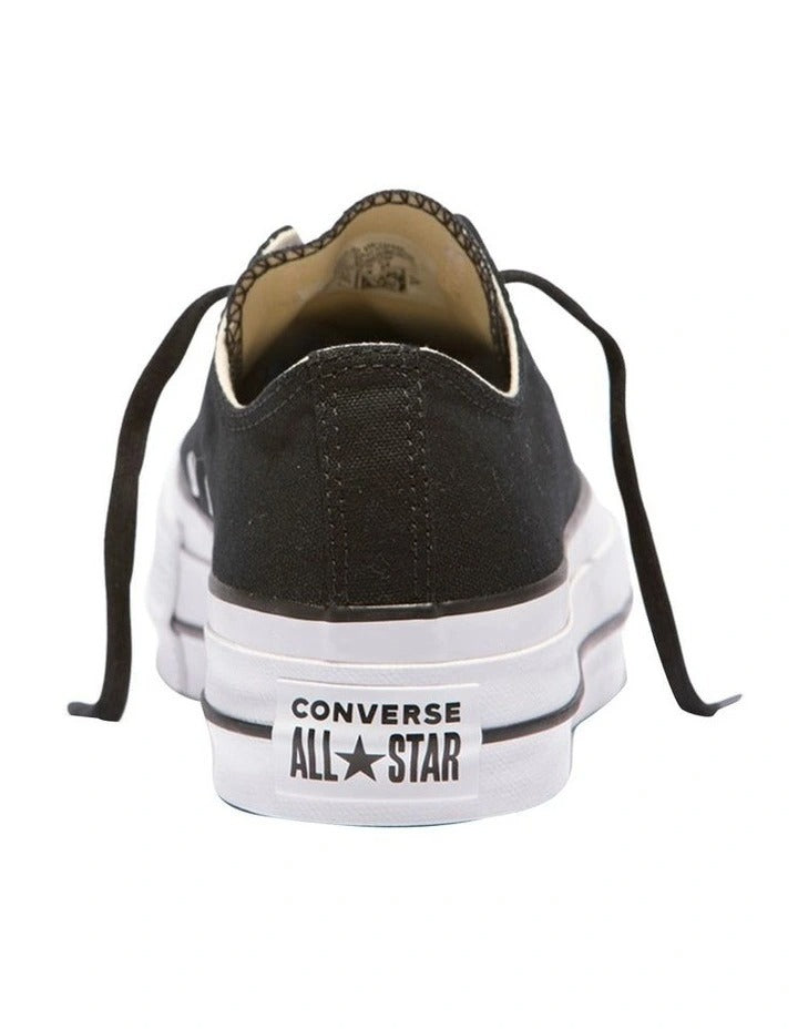 Converse Chuck Taylor All Star Lift Low Top Canvas Sneaker in Black, featuring a stylish platform sole and classic design.