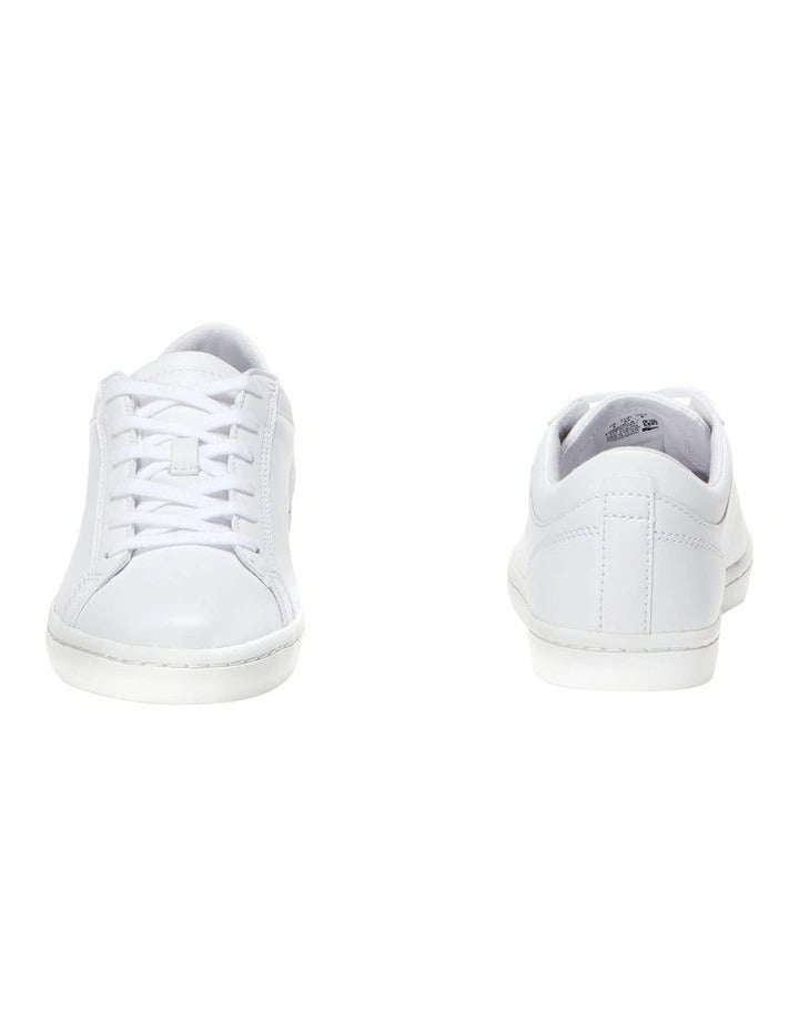 Lacoste Straightset BL I White leather sneaker with quilted collar, mesh lining, and green crocodile branding.
